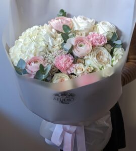Bouquet of flowers with hydrangea and ranunculus 'Tatyana'
