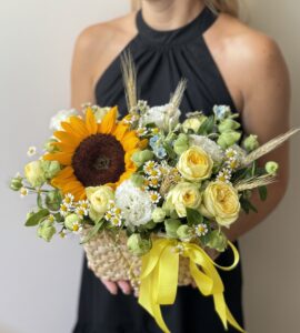 Basket of flowers with sunflowers