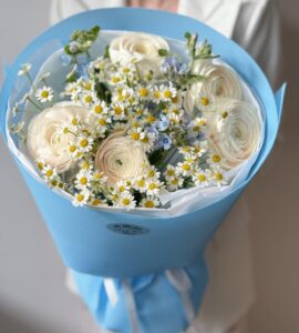 Bouquet of flowers with daisies and ranunculus