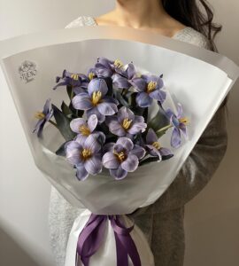Bouquet of thirteen purple tulips
