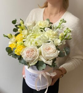 Flowers in a box with chrysanthemum and roses 'Iceberg'