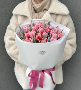 Bouquet of twenty-five snow-covered tulips