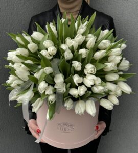 Bouquet of one hundred and one white tulips in a box