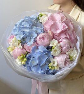 Bouquet of hydrangeas with peonies and freesia