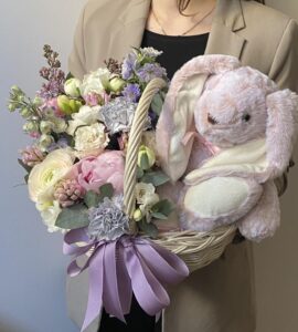 Basket of flowers with a bunny