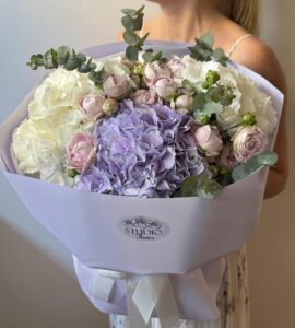 Bouquet of hydrangeas with bush rose Blossom