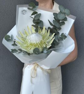 Bouquet with white king protea and eucalyptus