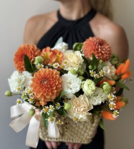 Dahlias bouquet in a basket