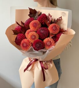 Bouquet of thirteen dahlias with quercus