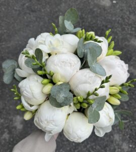 Bridal bouquet with peonies and freesia