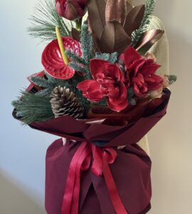 Winter bouquet with amaryllis and spruce